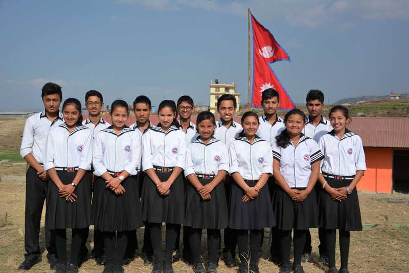 a team of student standing together
